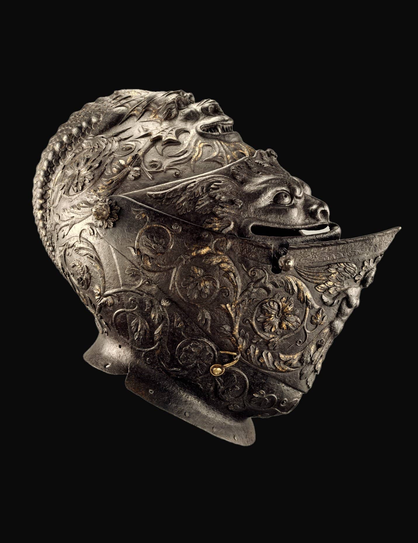 Embossed close helmet by Giovan Paolo Negroli, Milan, about 1540 to 1545, steel and gold (The Met)